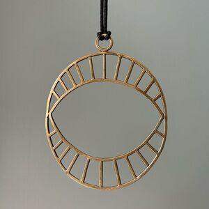 MUSIBATTY brass evil eye necklace